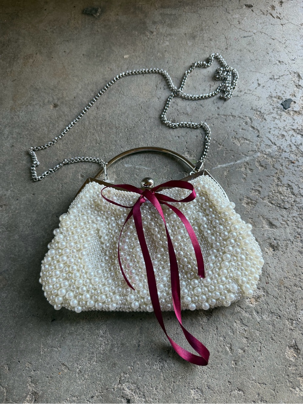 Pearl-Embellished Ivory Evening Clutch with Burgundy Bow